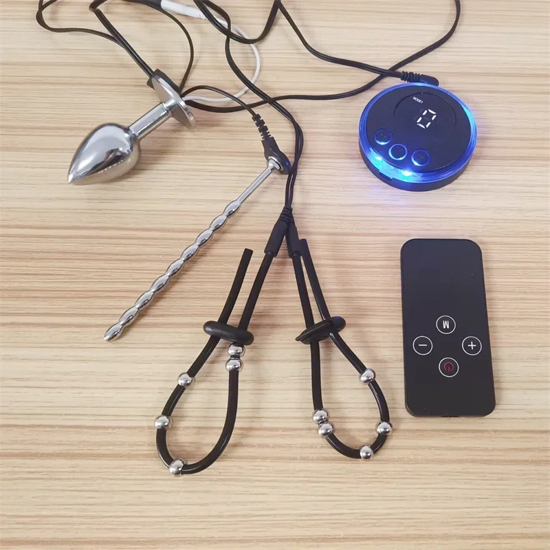 1 sada 8 režimov Elektrický šokový kovový penis zástrčka Anal Bead Horse Eye Uretrátor dilatátor Znie to silikónové kohúty