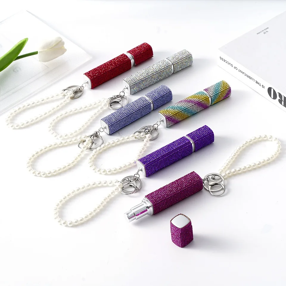 10 ml nového doplňovateľného kľúča Parfumový fľaša fľaškový kryštál kamienok kľúča kľúča Parfumy Atomizer Leskiny prázdna sprejová fľaša cestovanie