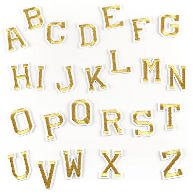 10 rovnakých počítačov/veľa zlatých vyšívaných abecedných písmen, oblečenie