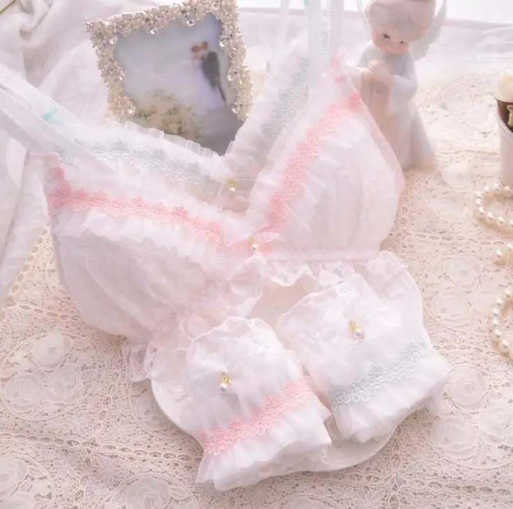 100% skutočné fotografie Dobrá kvalita Lolita Sexy Cute Kawaii Svadobná biela čipka Čalúnený bezdrôtový drôt zadarmo bezšvové podprsenky Set RB293