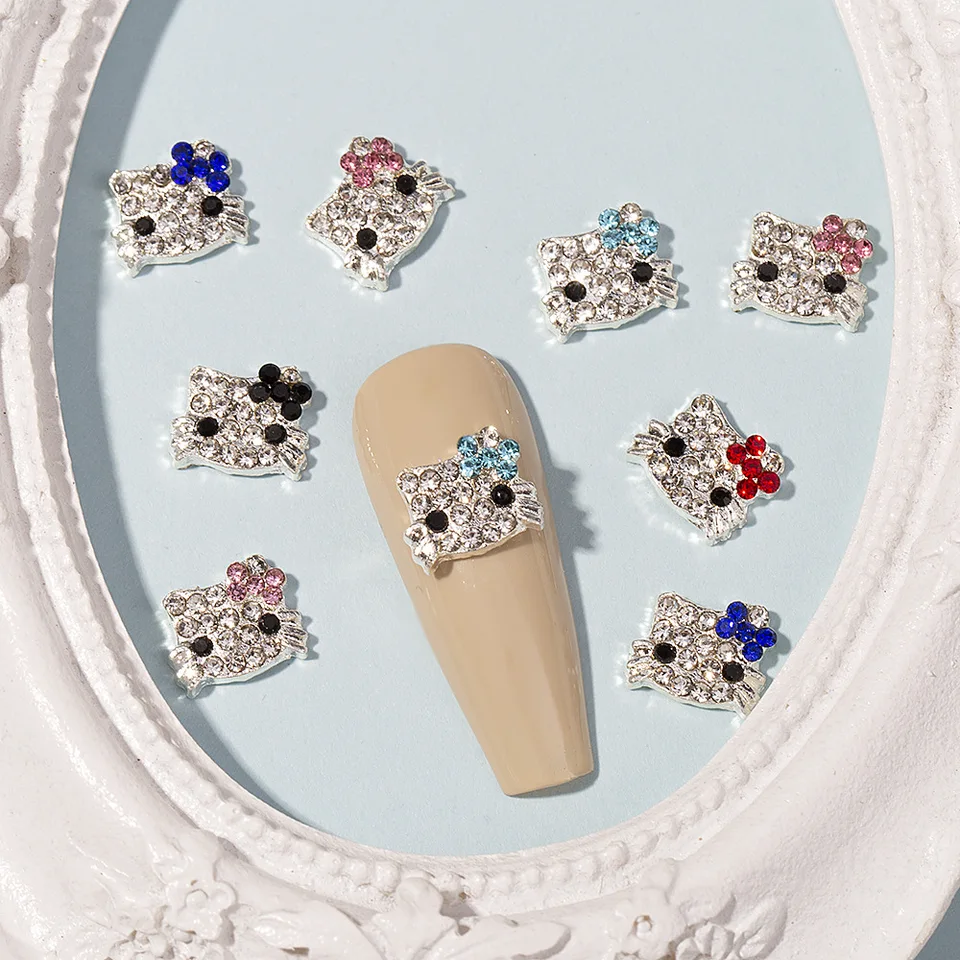 10ks Hello Kitty Nail Charms Sanrio 3D zliatiny plné diamantové šperky nechty na nechty kamerový kamen
