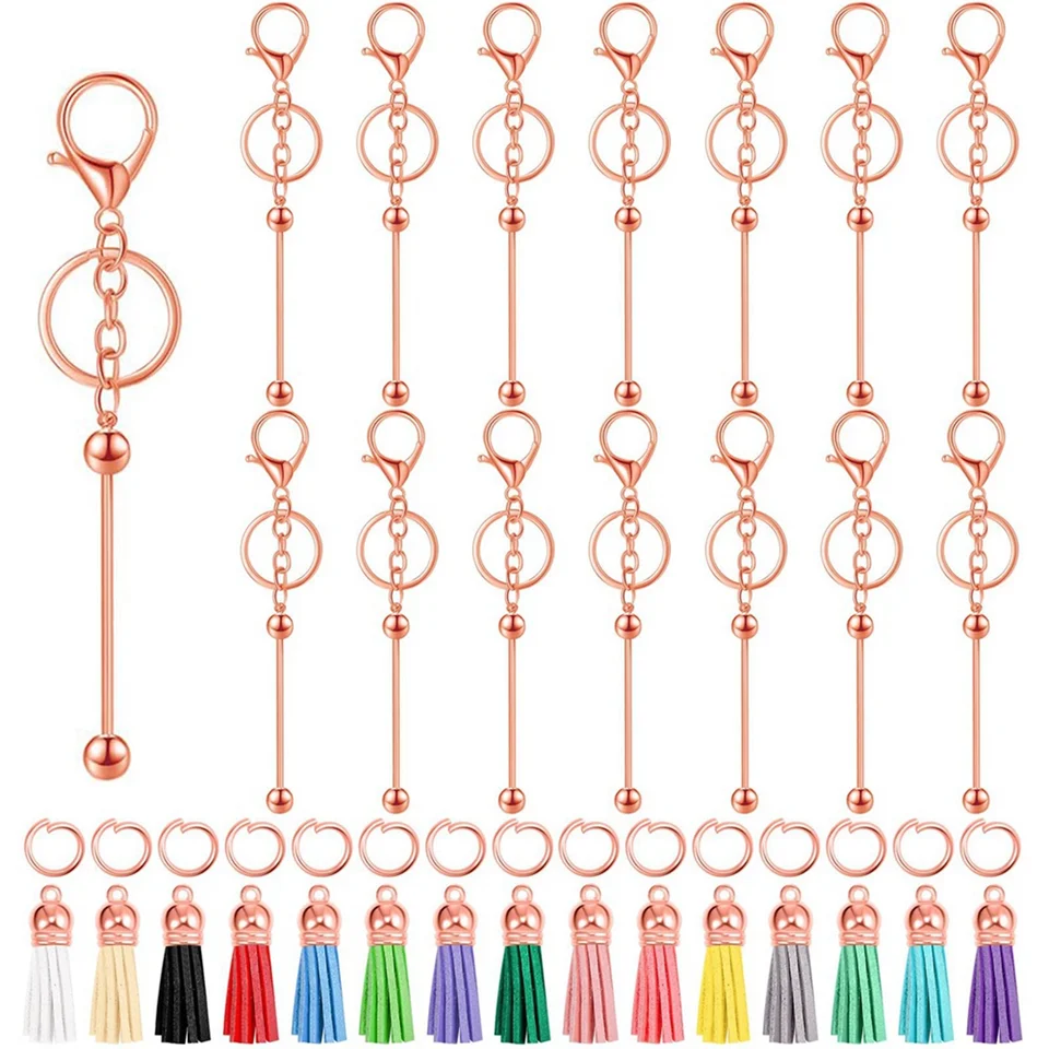 15 ks s guľometovými kľúcmi tyč kovový kovový slepý keychain s 15 ks koženými strapcami pre DIY korálkové keychainové zásoby, ružové zlato