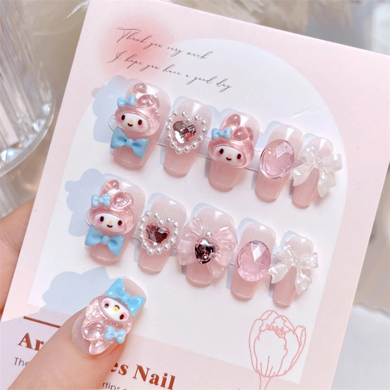 1box (24ks+želé gél) Kawaii Sanrio My Melody Girls Press na nechty ružové 3D srdcové/luk dizajn kúzla Nositeľné falošné/falošné tipy na nechty