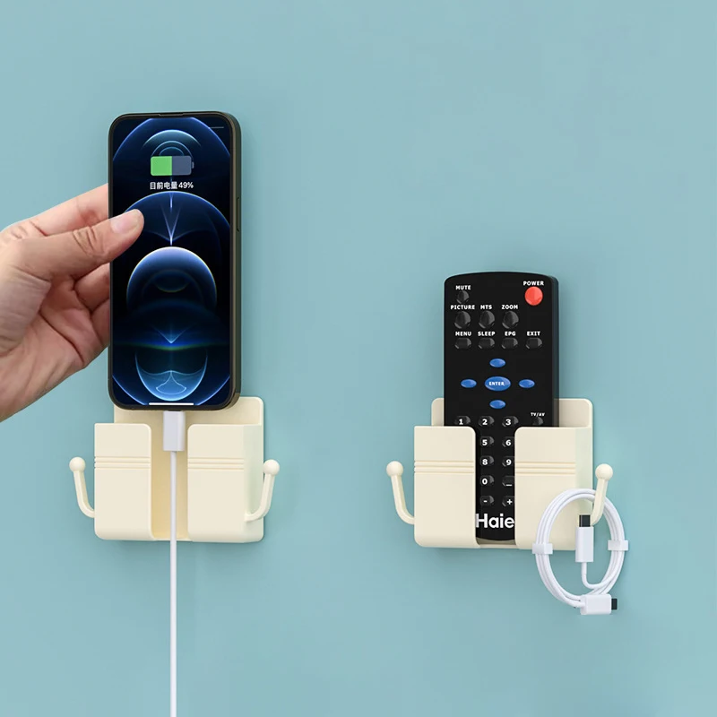 1PC Organizátor mobilného telefónu White Punch Free Wall Mount Plug Plug Držiak stojan klimatizácie TV Diaľkové ovládanie úložného priestoru