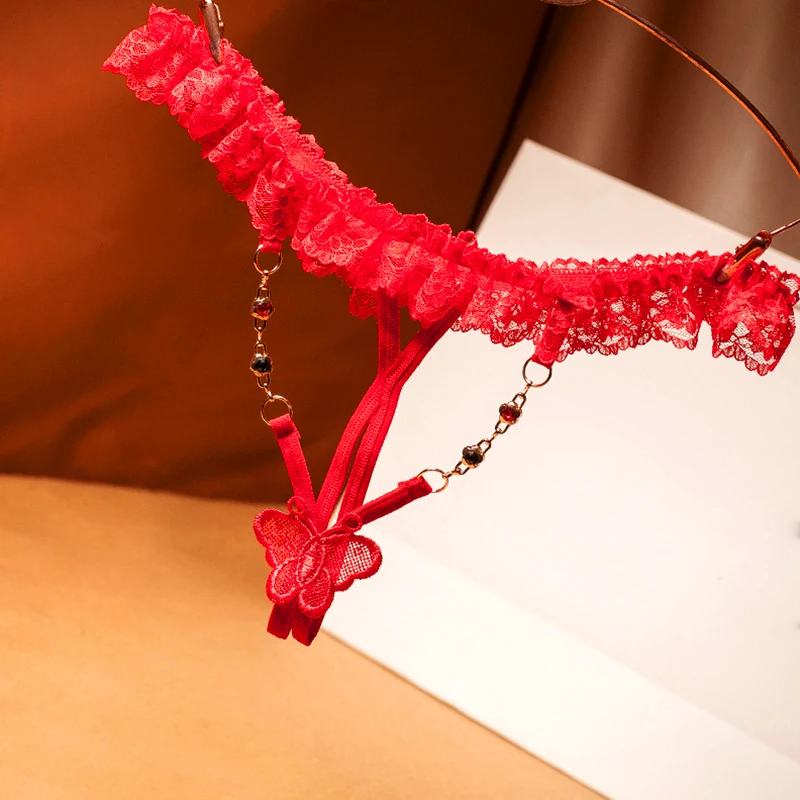 1pc sexy žien T-Back G-Strings nízky pás bez pásu bez krízového sexy čipky Realizály Relámy erotické malé motýľové nohavičky kamienok