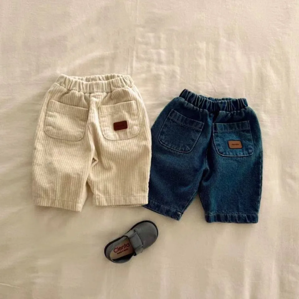 2024 Jeseň Nové detské džínsy Dievčatá Corduroy Nohavice Solidy Boys Pocket Casual Pants Klenu Dieťa Univerzálne džínsové nohavice