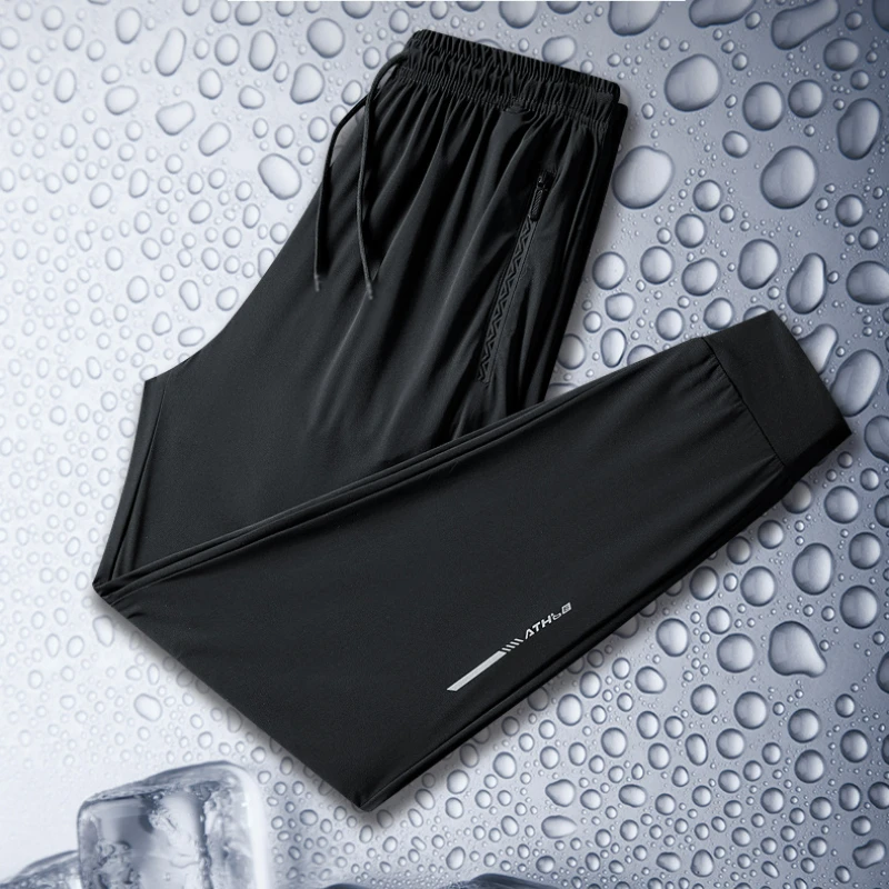2024 Letné neformálne nohavice Pánske hodvábne hodváb Pohodlné priedušné natiahnutie Hallen Pants Gym Sports Sports Rýchlo vysušenie bežiacich nohavíc voľný