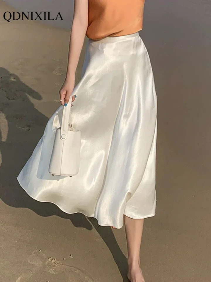 2024 leto nové dámske sukne Elegantné elegantné kyselina octová tkanina midi dĺžka vysoký pás Schetywear Satin Thin White Woman Sukňa