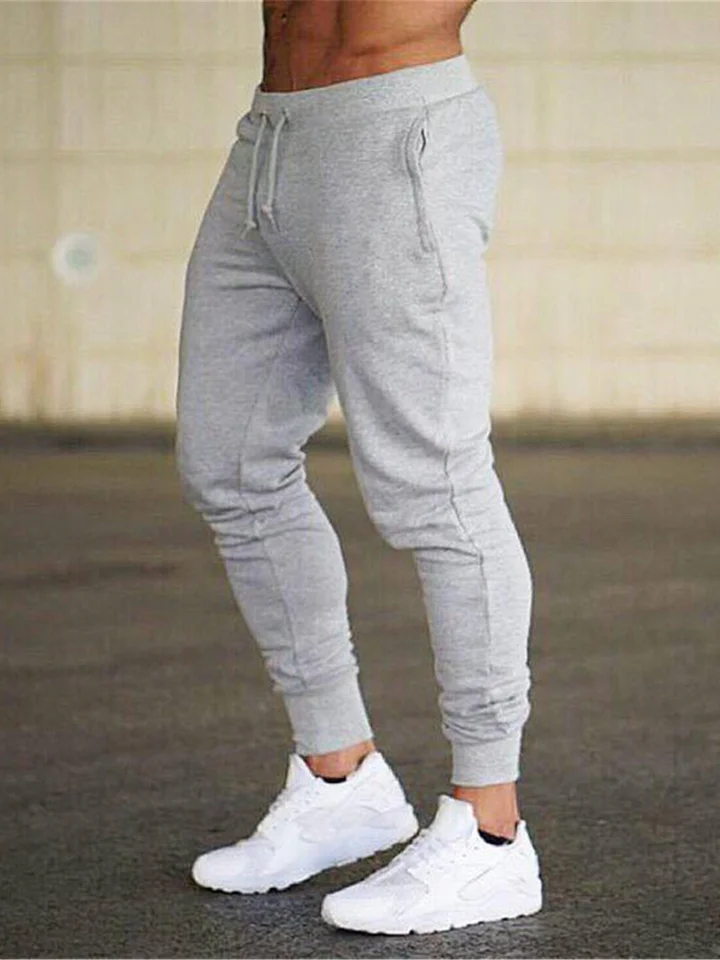 2024 Módne muži telocvične Čisté farebné nohavice Joggers Fitness Príležitostné dlhé nohavice Muži Cvičenie Skinny Swelling Shockovacie nohavice