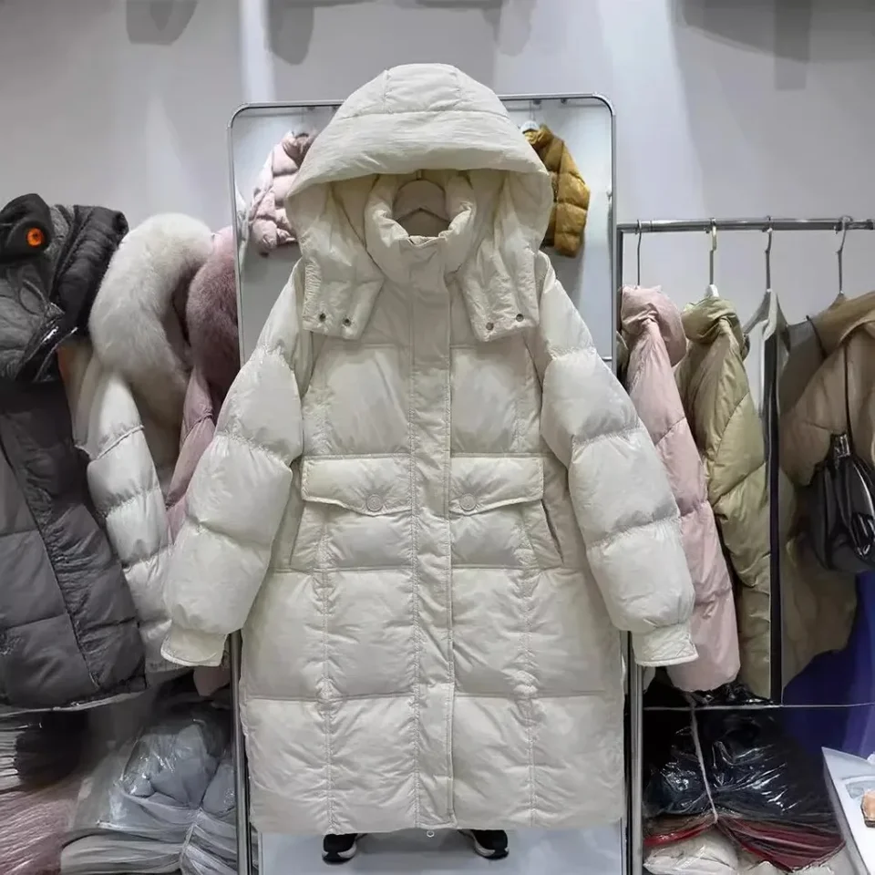 2024 Nová dlhá kapucňa Zhrubne uvoľnená voľná rovná teplá kabát Príležitostná módna kancelária Lady White Duck Down Bunda Ženy