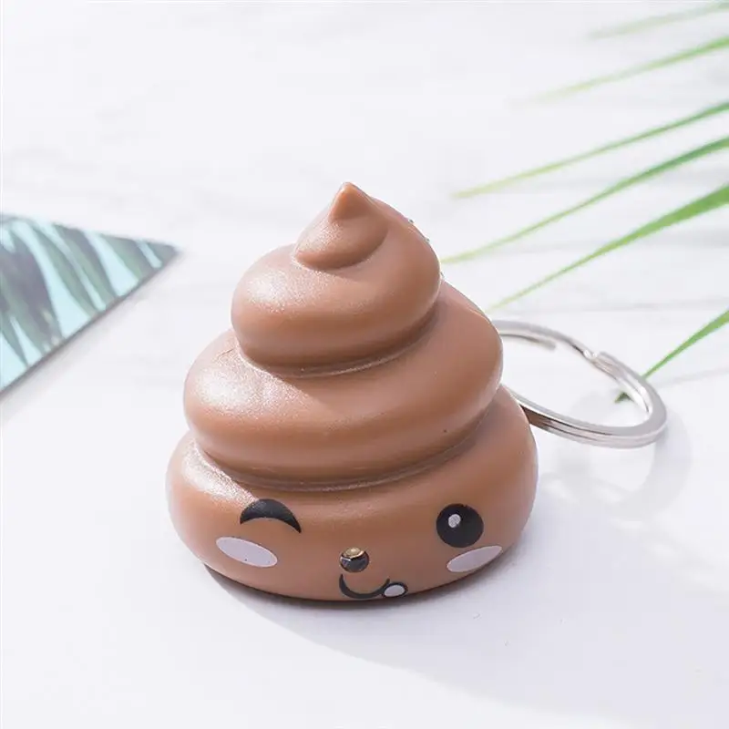 2PC Funny Trick Stool Keol retiazka Svetlá vlasová ozdoba stolica kľúča kľúče vrecko prívesok malý darčekový hovno v tvare Keychain Prívesky