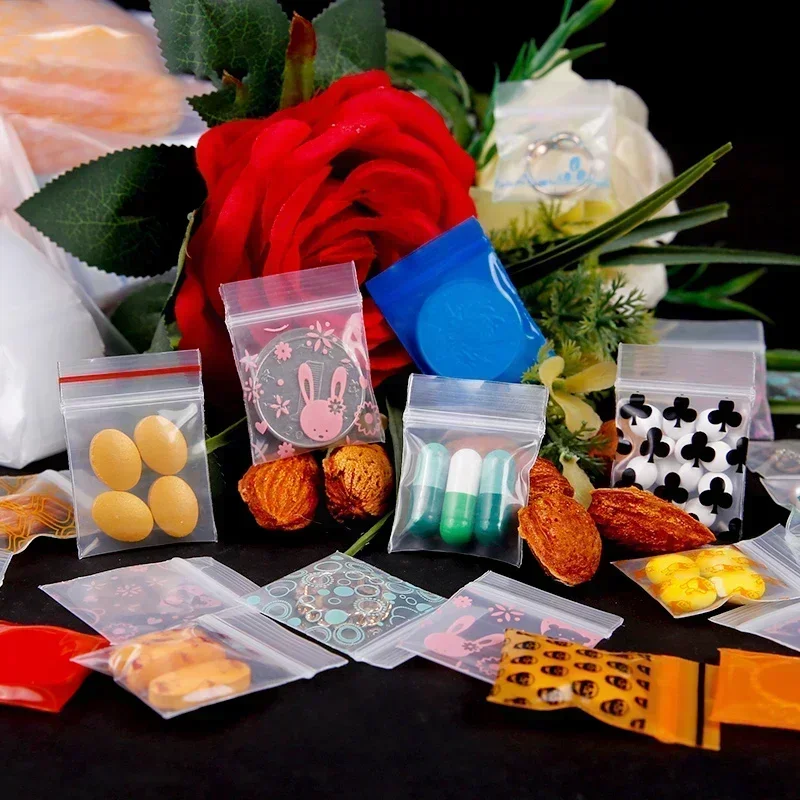 3x4cm hrubý priehľadný ziplock malá taška roztomilý karikatúra čistá plastová samovelí taška šperky tablety Skladovacie balenie Mini vrecko