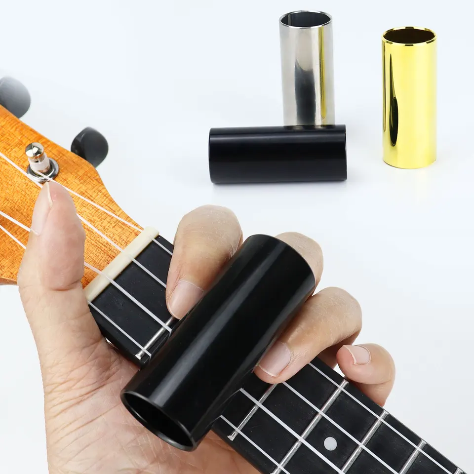 60 mm gitarista z nehrdzavejúcej ocele - dostupná v čiernej, striebornej a zlatej. Vylepšuje hudobný prejav pre ukulele a gitaru