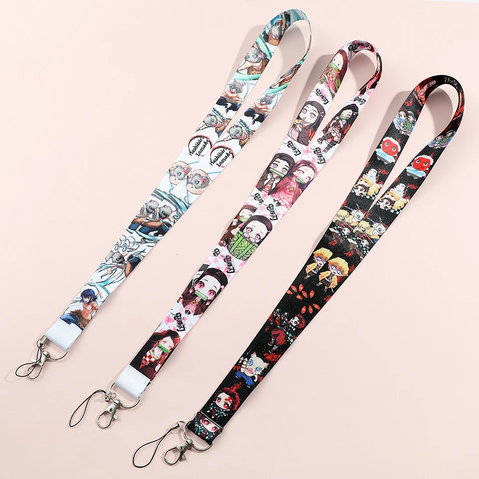 Anime démon Slayer krk popruh šnúrky roztomilý Brinco Blade z duchovného mobilného telefónu ID retiazka Kľúčový reťazec Kamado Tanjirou Pompom cosplay