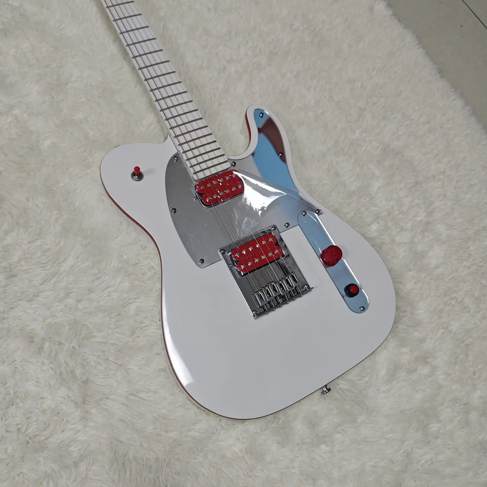 Biela šesťpruhová elektrická gitara, teleso basov, javorový krk, javorový biely hmatník s červenými bodkami, elektroplatový panel.