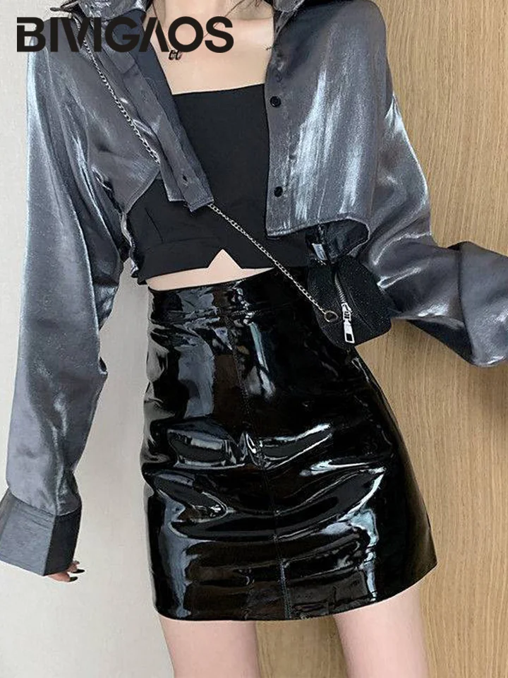 Bivigaos čierne zrkadlené kožené sukne PU Ženy Žiarivé kože s vysokým pásom Sexy balenie Hip sukňa tesné štíhle A-line krátke sukne