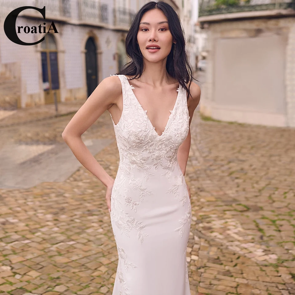 Chorvátsko vintage saténové svadobné šaty bez rukávov Mermaid Appliques v krk backless kráľovský vlak robe de mariee prispôsobené