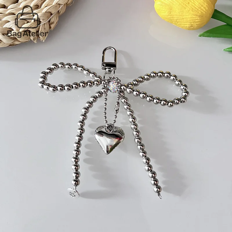 Delicate luk s korálkovými kľúče prívesok ručne vyrábaný ručne vyrábaný mašľový kľúče v tvare kľúča mobilný telefón Lanyard Perl Bag Charm Dekorácie