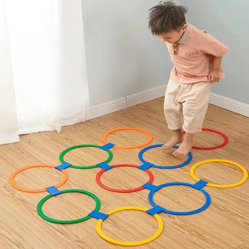 Deti rastú vyššie outdoorové farby vtipné telesné tréningy Športové hračky mriežky skákacie prsteň set hra pre park Play Boys and Girls
