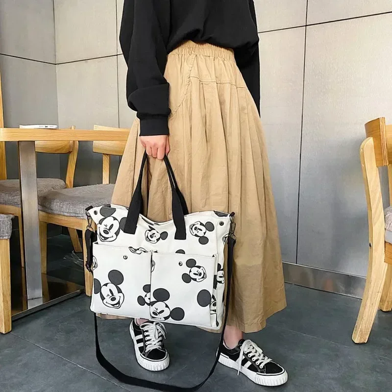 Disney Mickey Mouse Canvas Ramery Bag Female Messenger Bag College Študentská trieda veľká kapacita japonská kabelka