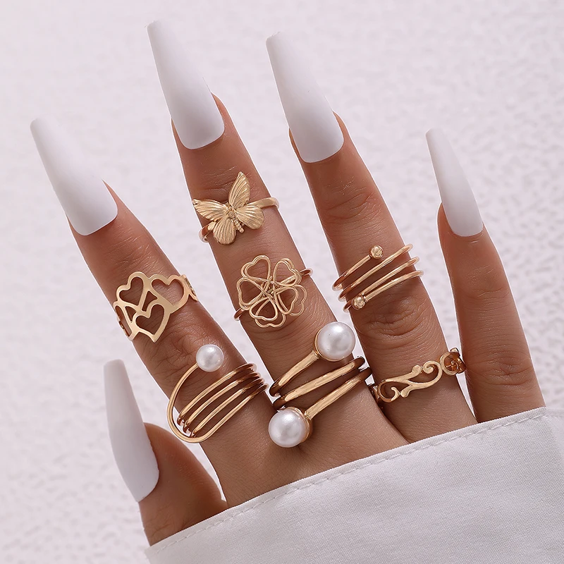 Docona 7pcs/set Jednoduchá kvetina motýľ Love Dutlow Out Out Out Out Geometry Geometry zliatina perla Stone Špirála sada Svadobné šperky