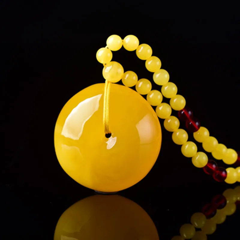 Drenážny darček živá šou Factory Veľkoobchod včelí vosk Amber Arhat Eye Pendant Simple muži a ženy