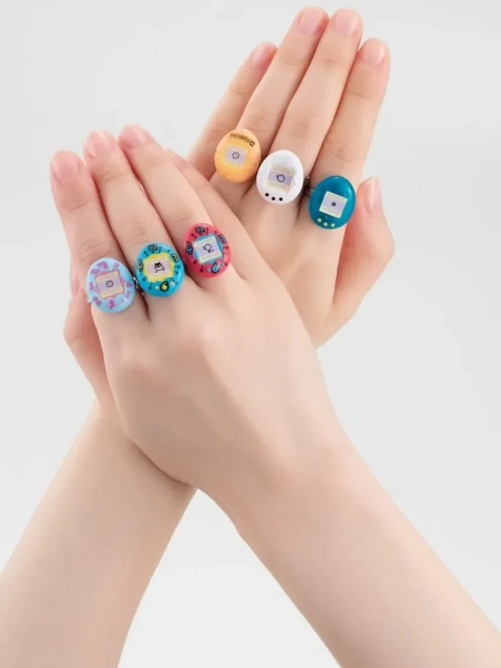 Elektronické domáce zvieratá hra Originálne bandai tamagotchi reprodukčná séria Yuanzu Ring Ring Electronic Pet Machine Game