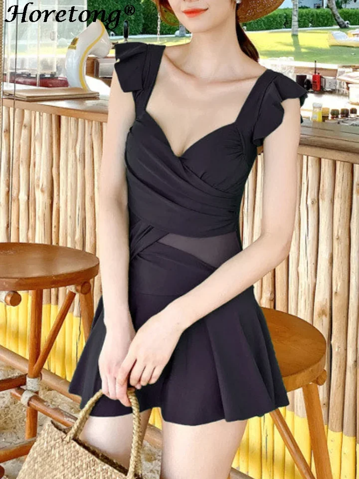 Horetong Women Sexy One Plaimsuit Rufle Ruckve V-krk High Wase Beach Wear 2024 Nový pevný elegantný plavkový dovolenkový oblečenie