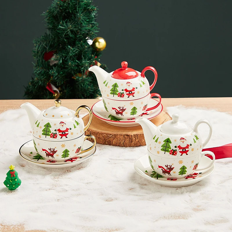 Keramická čajová kanvica a misa so zlatými čajmi Santa Claus