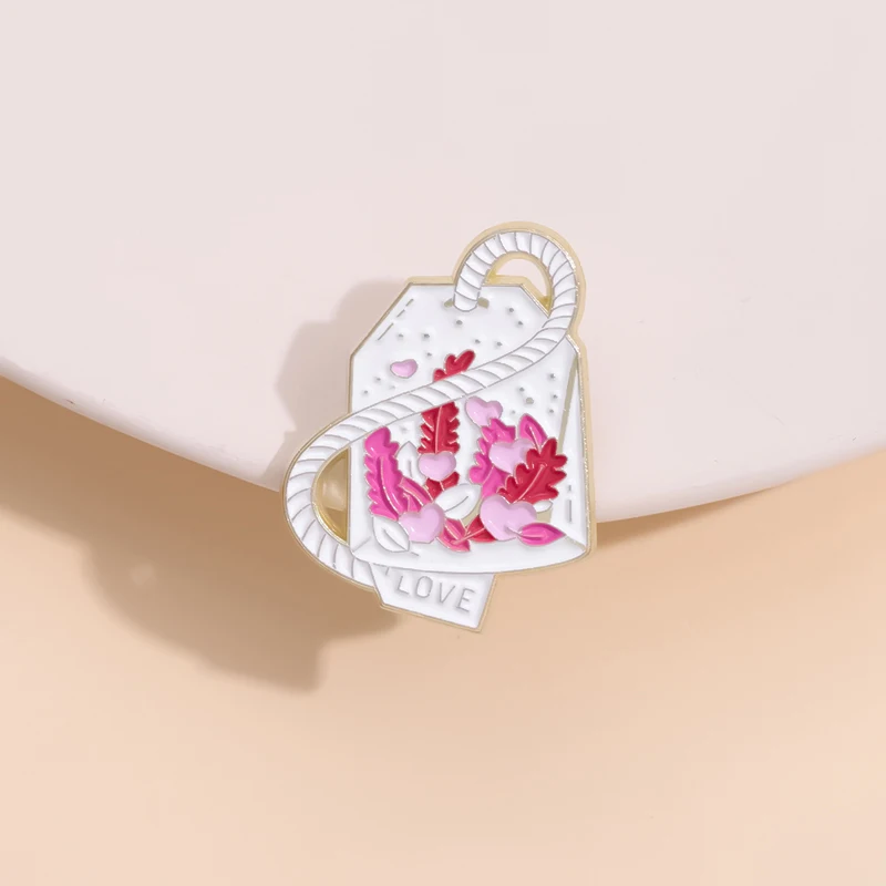 Kvetinový ovocný čaj Čaj mliečna skrinka Smallová špendlíka Kreačný ružový srdcový čaj Čajový vrecko Brožby kĺzne kovové odznaky šperky Darčeky veľkoobchod