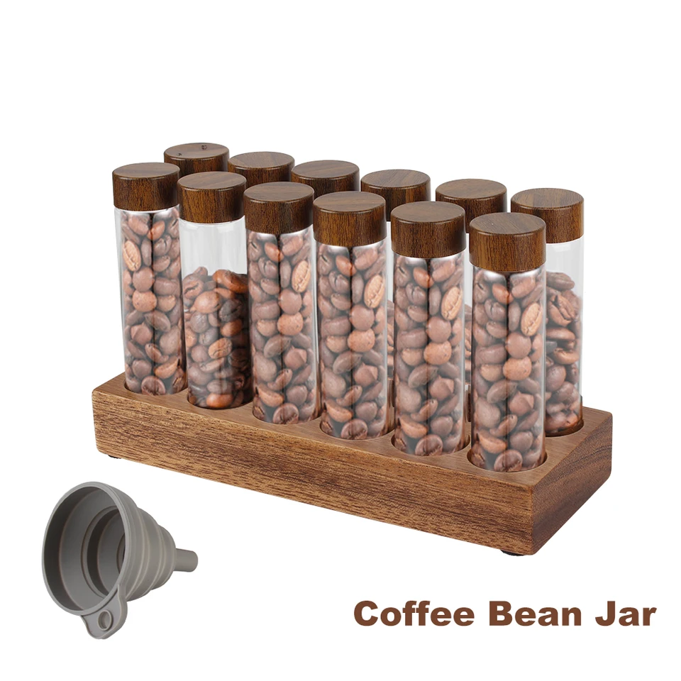 Kávové zrná môžu zobrazovať stojan na kávu, fľaša čajovej trubice fľaša sklenené espresso 6/12 káva