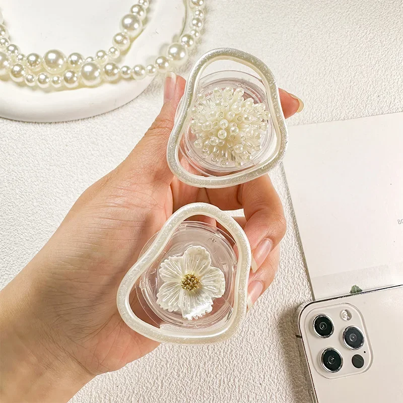 Kórea Ins Pearl Flower nepravidelný inteligentný tok Universal Phone Držiteľ Conch Shell Flower Telefón Držiak Griptok Lazy Bracket