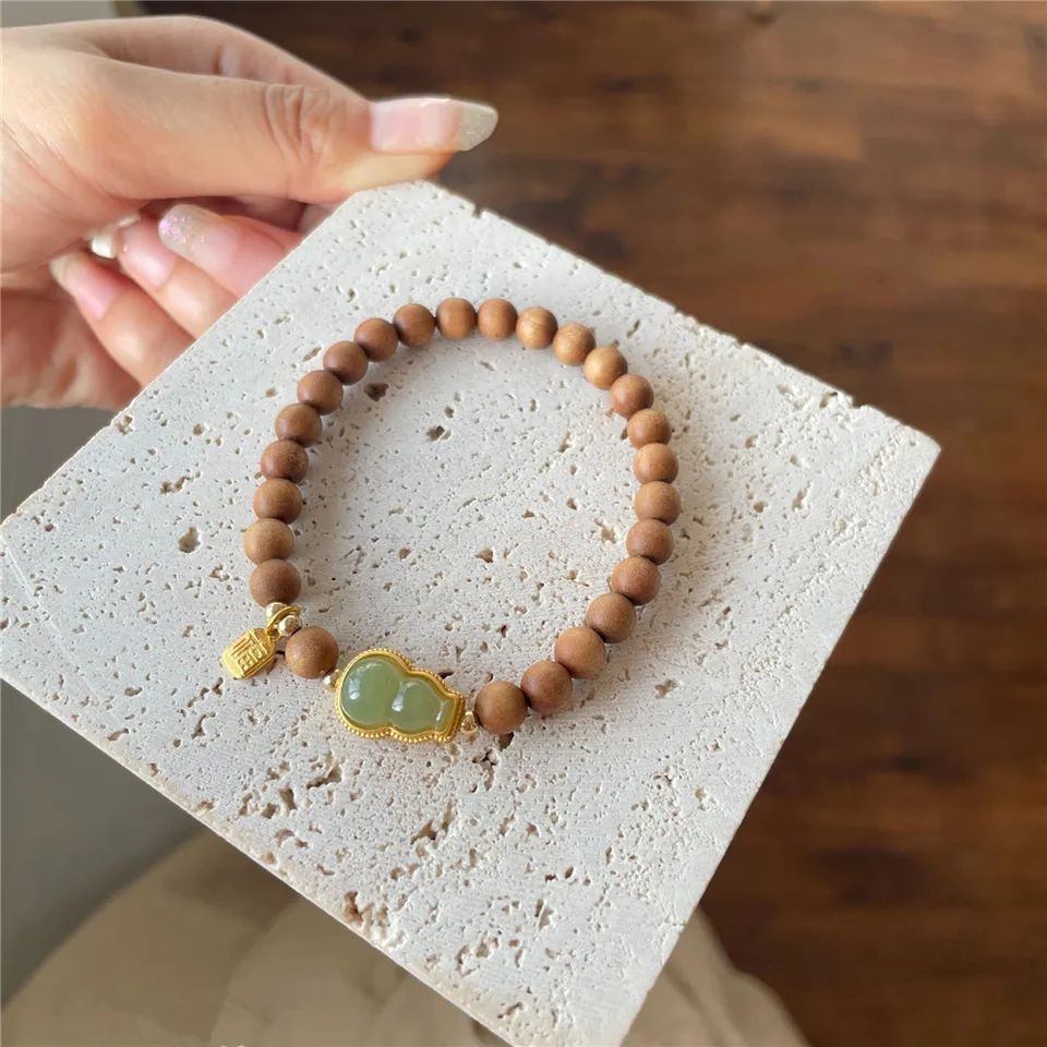 Laoshan Sandalwood Round Práľby Ženy náramok Prírodný hetian jade gourd Originálny dizajn elastická šnúra Wenwan Simple jemné šperky