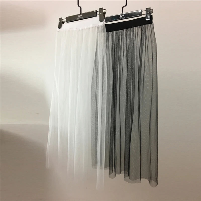 Letné ženy midi sukňa Kórejské dámy Príležitostné sexy vintage elegantné priehľadné priehľadné vysoké pásové čipky Čierna biela dlhá sukňa