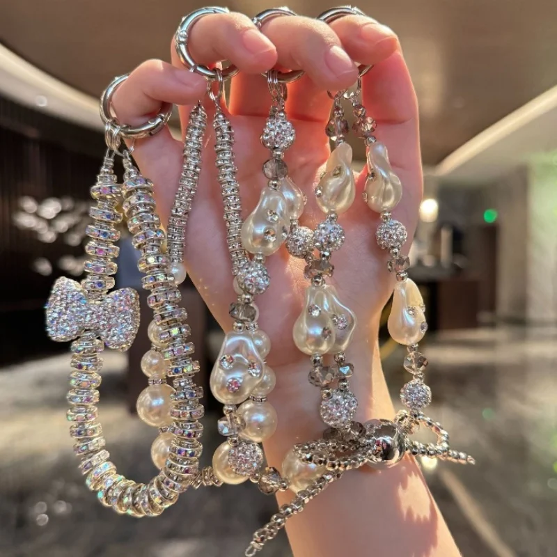Luxusné perly krištáľové korálky Kľúčové reťazce kúzlo kamienok na šnúrku pre iPhone Samsung Universal Accessories