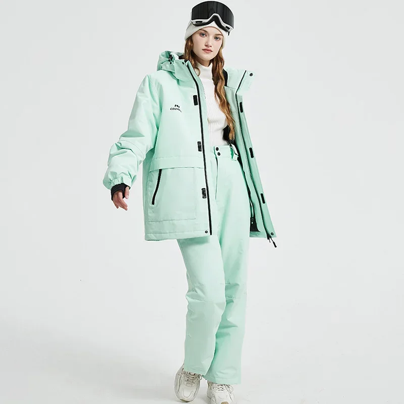 Lyžiarske apartmány zimné snehové odevy Dospelé odevy Ženy teplé lyžovanie set vonkajšie muži lyžiarske lyžovanie veterné nepremokavé vodotesné snowboardové bunky nohavice