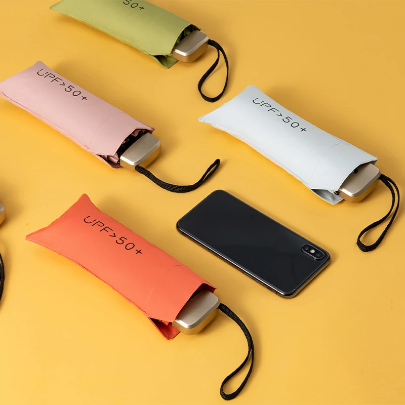 Mini slnečný dáždnik Malé vreckové dažďové dáždnik Vinyl skladací dáždnik UV ultrafialová ochrana slnečného tieňa vreckový parasol kapsula