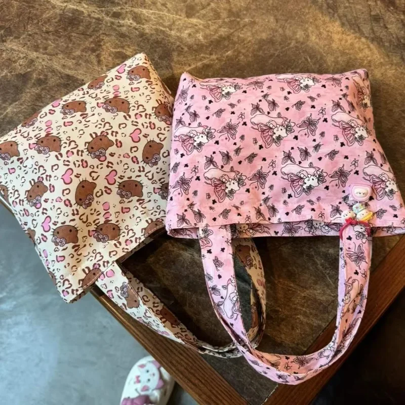 Miniso Bag Hello Kitty Anime Periférne plátno Tlač Tlač módnej prenosnej tašky s jedným ramenom Vysokokapacitné roztomilé y2k