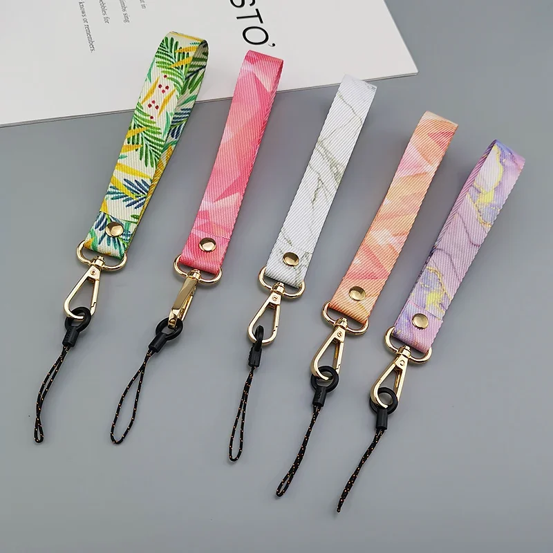 Mobilný telefón Lanyard krátke zápästie Ručné širokopásmové telefón Univerzálny klip opasok Anti-Lost Sling Female Creative Retro Pattern Lanyard