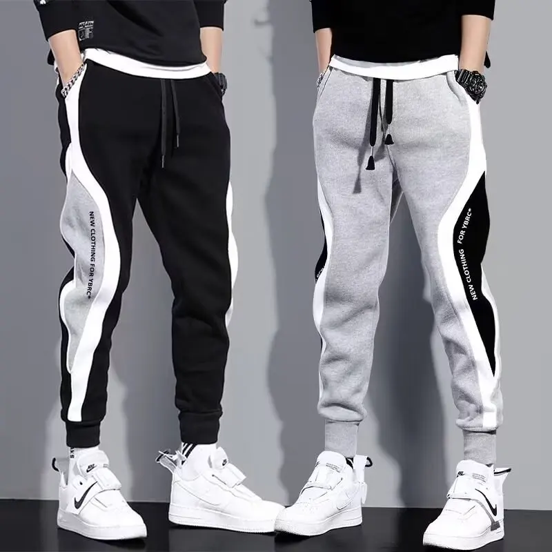 Muži čierne nohavice Hip hop recrajenie Rogger móda Pohodlné nohavice Mužské príležitostné tepláky uvoľnenie elastického pása športového oblečenia