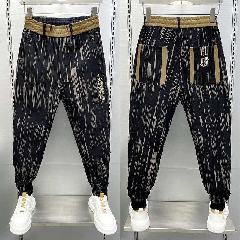 Módne murem harémové nohavice pruhované hip hopové streetwear Vysoko kvalitné jedinečné elastické pásy mužské nohavice bavlnené bežecké joggery