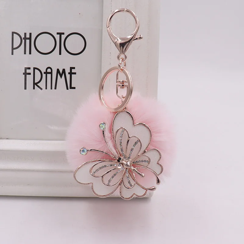 Nadýchaný motýľ plyšový plyšový keychain módna zliatina prívesok Ženy luxusné pompomové reťazové doplnky tašky dekorácie šperky darčeky