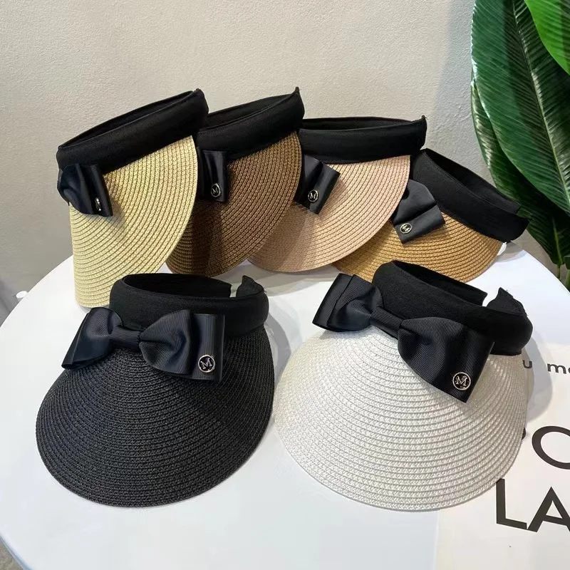 Nové letné prázdne top top raffia slamené klobúky Ženy Vonkajšie cestovné pláž opaľovacie krémy Anti UV Riding Sun Hat Girl Girl Big Brim Bow Visor čiapka