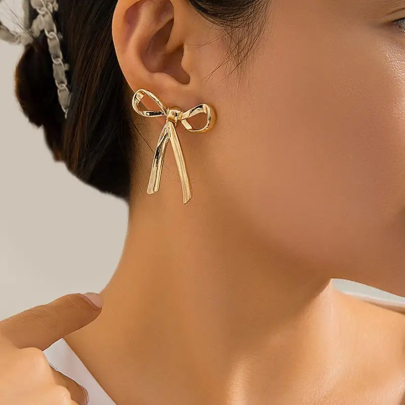 Nové náušnice moderných zlatých farieb pre ženy s lukmi gombík módne roztomilé šperky piercing uši doplnky vianočný darček orne