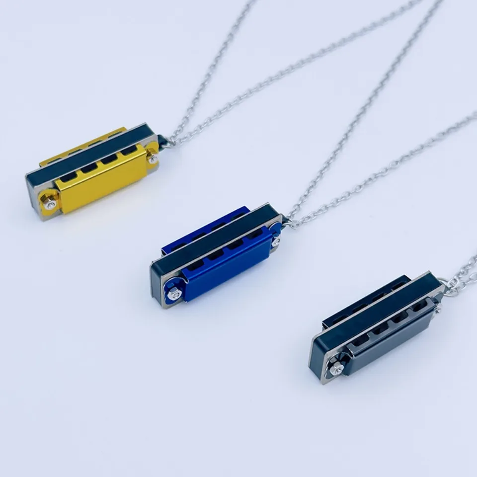 Nový 4-dier 8-tónový náhrdelník harmonika mini kov harmonika reťazec Woodwind Mini Musical Instrument Kids