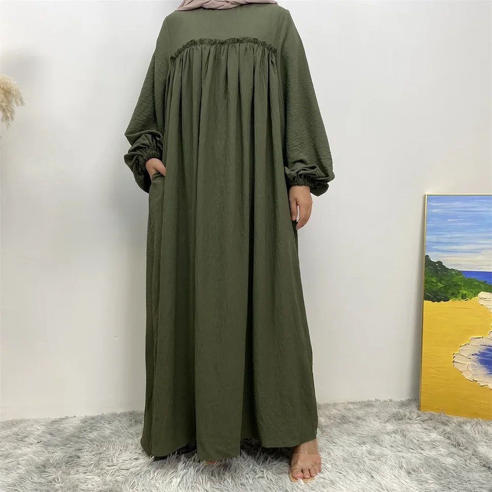 Nový príchod moslimské ženy Abaya s vreckami voľný obrusový rukáv Elegantná ramadánová modlitba oblečenie kaftan zelená farba arabské oblečenie