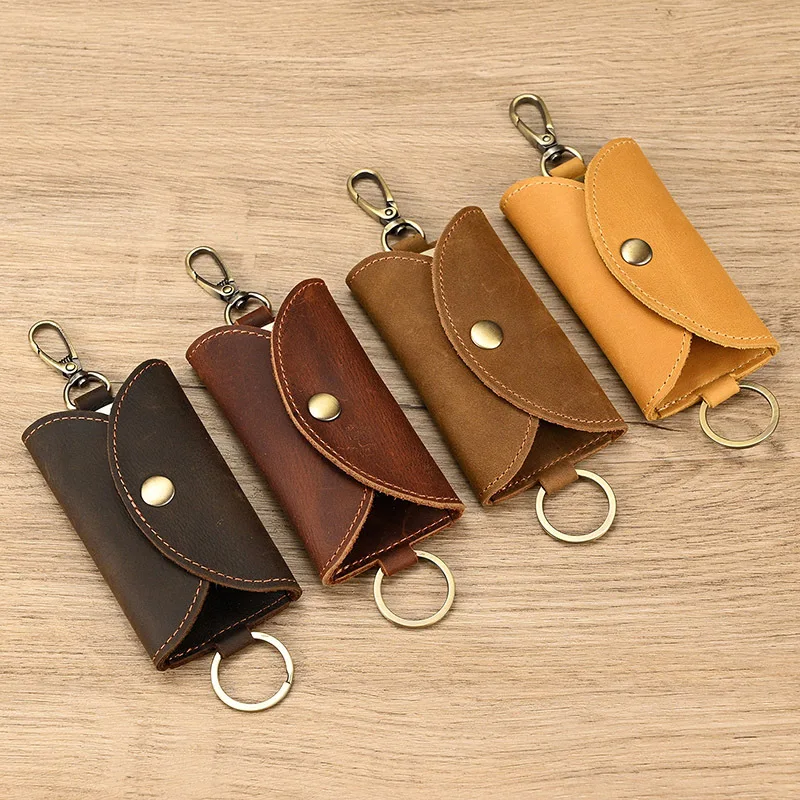 Originálne kožené kľúče Men Ženy Vysoko kvalitné spona Multifunkcia Key Bag Držitelia držiakov Klávesy Organizátor Puzdro