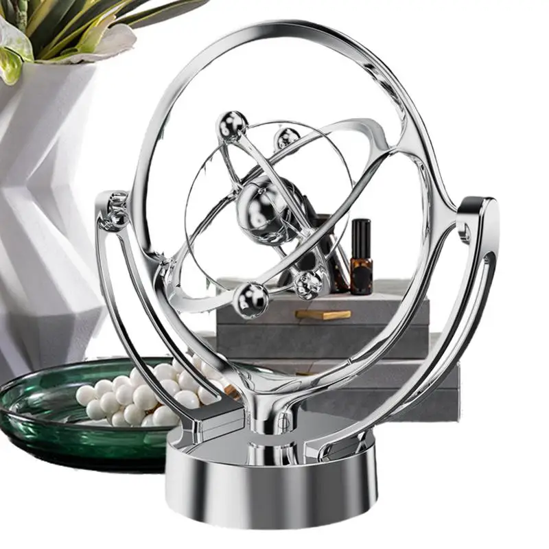 Perpetual Motion Machine Desk Toy Hray na Zemi zameraný na Zemoted.