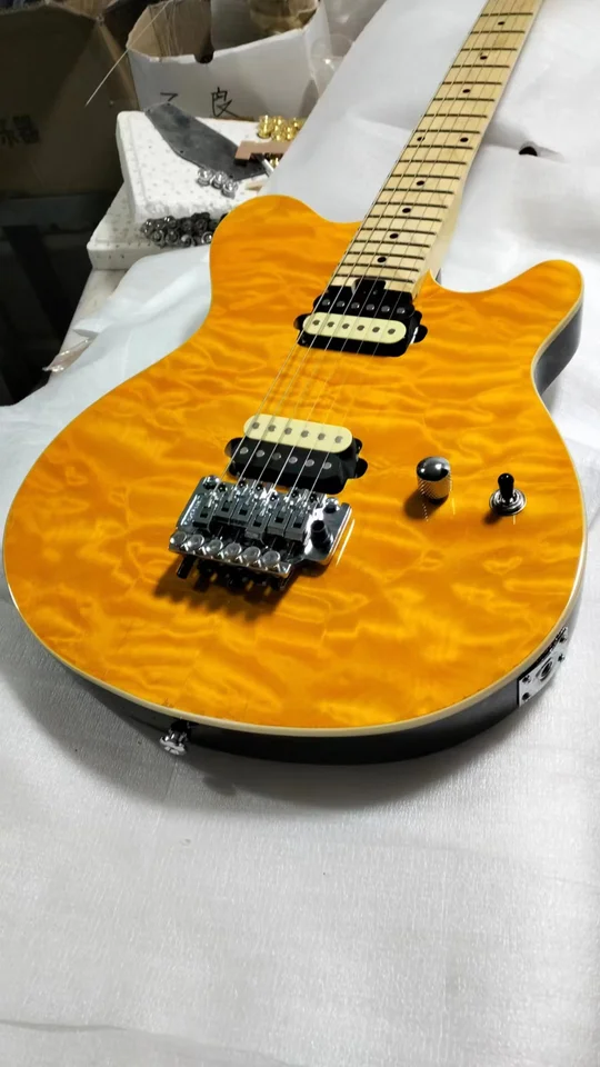 plameň javorovej gitarovej dýhy oranžová hudba štýl eelektrická gitara