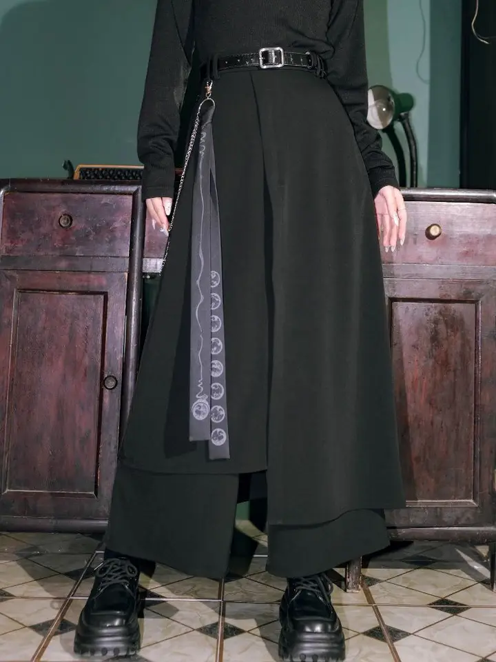 Retro tmavý nový čínsky štýl Viacvrstvové nepravidelné čierne culottes pre ženy jar a leto voľné nohavice Yamamoto so širokými nohami